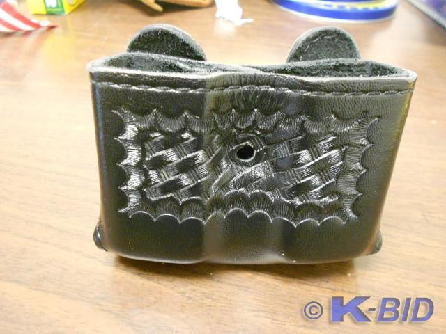 All black leather buckle carry case...