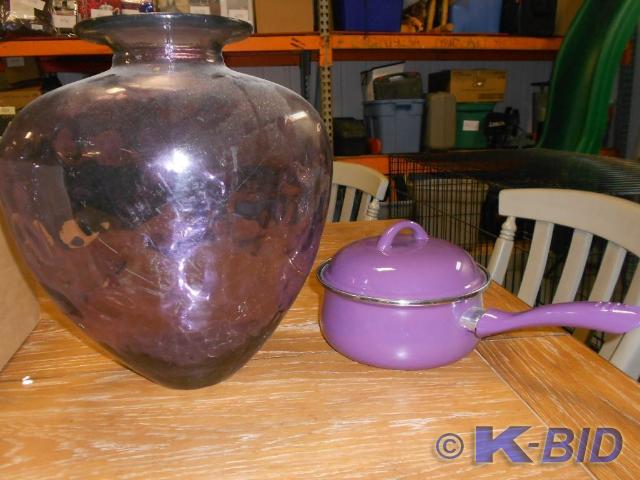 Purple vase and cooking pan. &nbsp