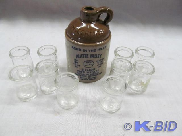 lot 48 image: McCormick Whiskey Jug 5T and 10 Sm...