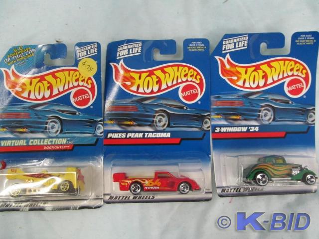lot 11 image: 3 Hot Wheels 164 scale New In Pack...