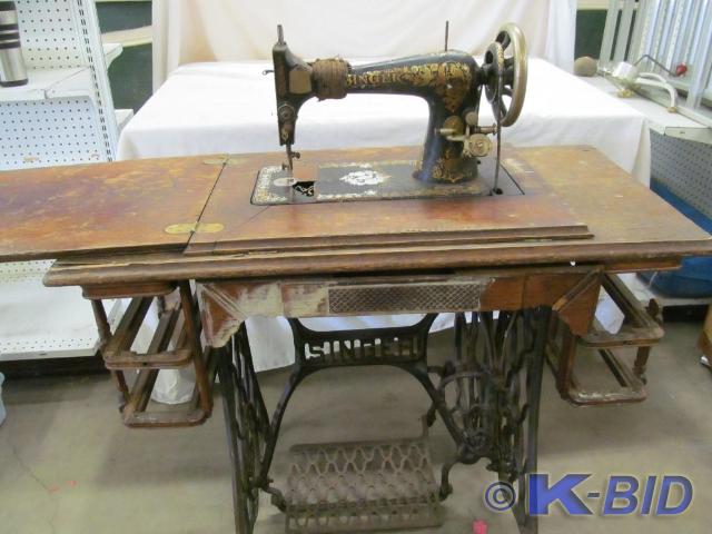 lot 110 image: Singer Treadle Sewing Machine in ca...