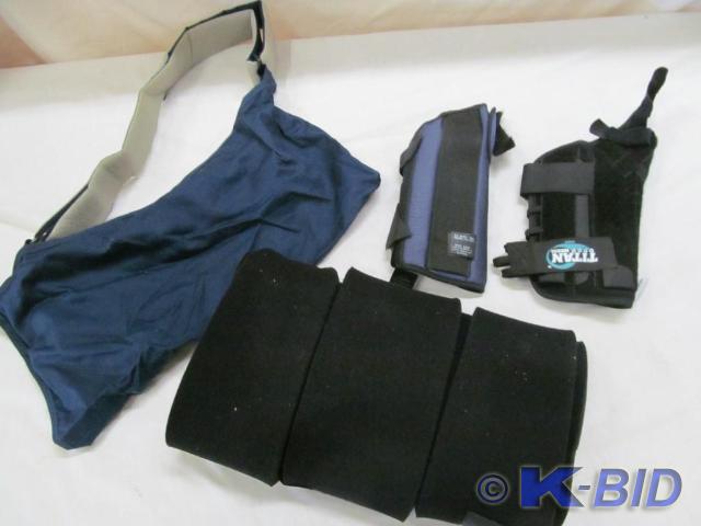 lot 126 image: Wrist brace, sling and knee brace