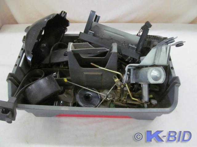 lot 150 image: Bucket of used car parts, door lock...