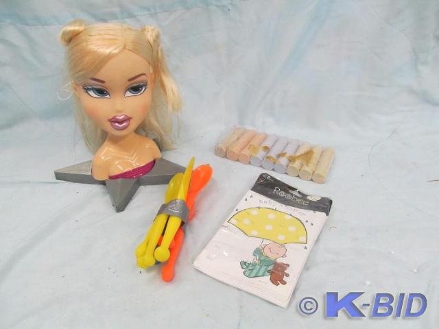lot 63 image: Hair and Make up doll, sidewalk cau...