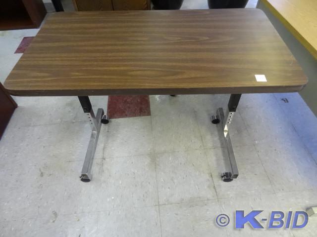 lot 101 image: 36 x 20 adjustable height table.