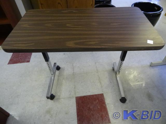 lot 102 image: 36 x 20 adjustable height table.