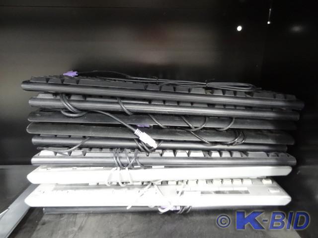 lot 131 image: 9 computer key boards