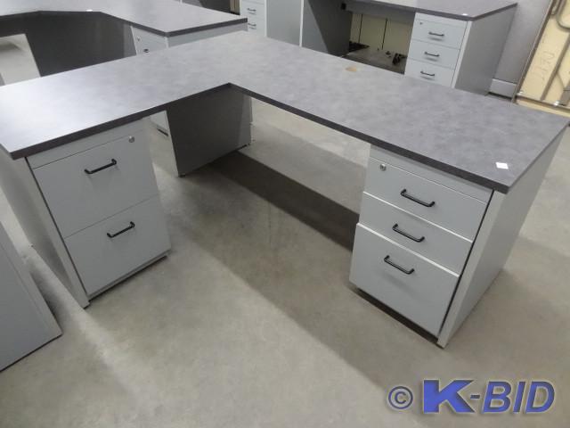 lot 185 image: L shaped laminate office desk. 5 dr...