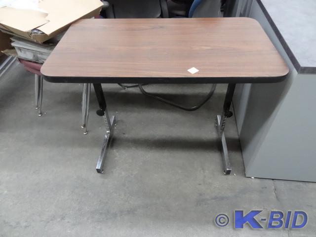 lot 193 image: Adjustable height table. 36 x 20