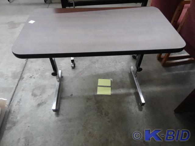 lot 275 image: 36 x 20 adjsustable height table.