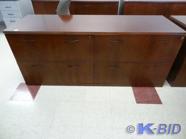 lot 32 image: 4 drawer lateral file credenza. Has...