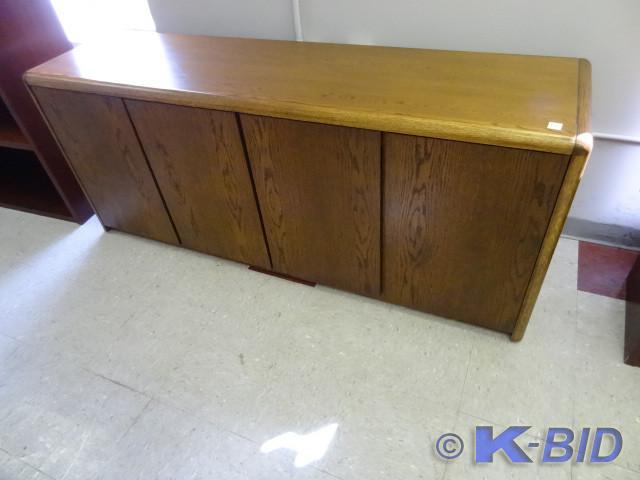lot 82 image: Wood credenza. 4 door. 73 x 20 x 30