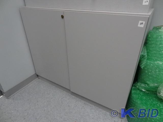 lot 104 image: 2 door cabinet. Laminate. 45 x 16 x...