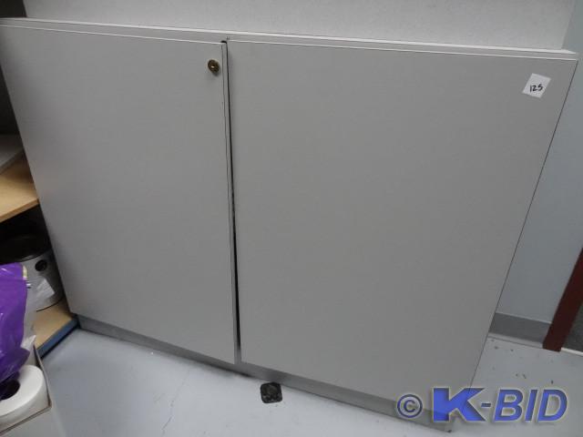 lot 125 image: 2 door cabinet. Laminate. 45 x 16 x...