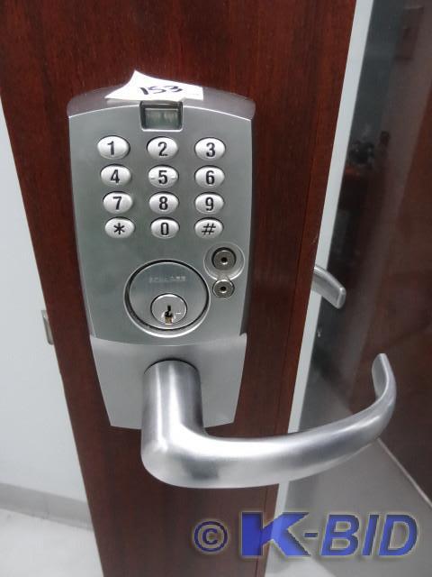 lot 153 image: Medeco combo  key door lock. Comes...