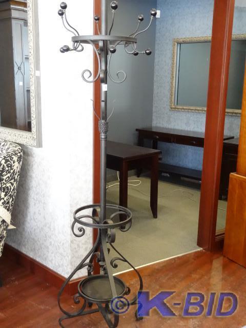 lot 18 image: Decorative metal coat rack. Holds 6...