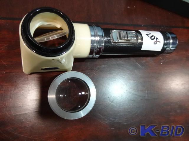 lot 208 image: Lighted magnifying glass
