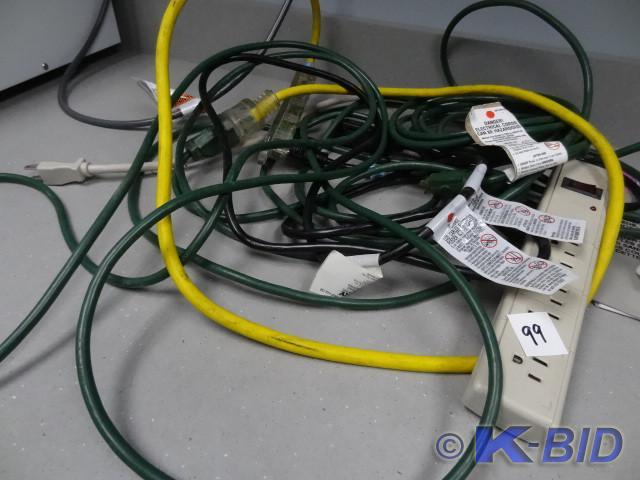 lot 99 image: Outlet strip and extension cords