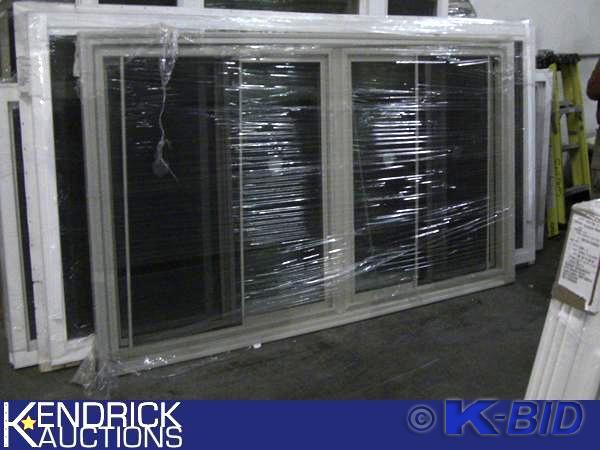lot 134 image: 1 Lindsay Vinyl Framed Double Mulled Slider Window