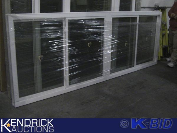 lot 136 image: 1 Lindsay Vinyl Framed Double Mulled Slider Window