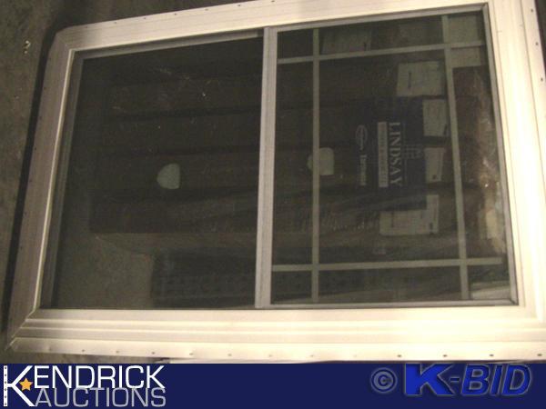 lot 28 image: 1 Lindsay Vinyl Framed Double Hung Window With Grid