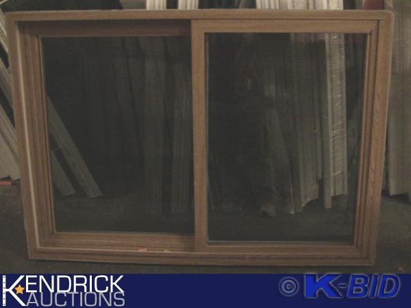 lot 48 image: 1 Heartland Vinyl Framed Double Slider Window