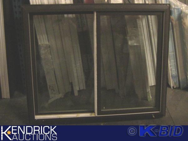 lot 49 image: 1 Heartland Vinyl Framed Double Slider Window