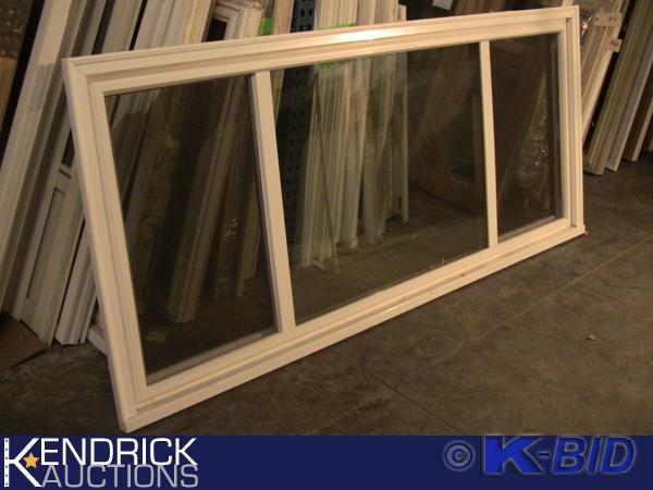 lot 64 image: 1 Lindsay Vinyl Framed 3 Lite (14, 12, 14) Slider Window