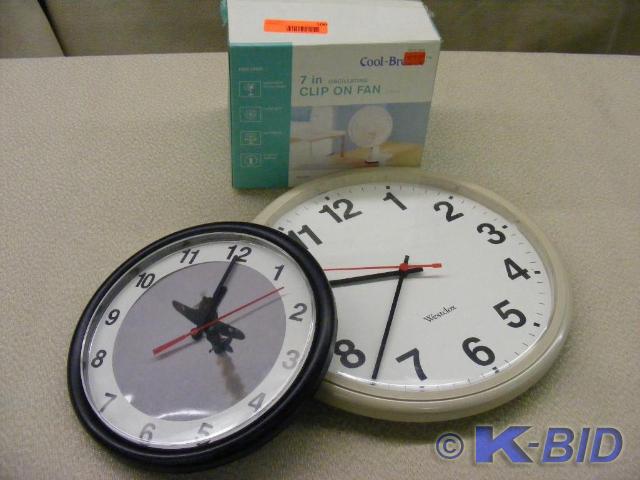 two wall clocks and new in box clip...