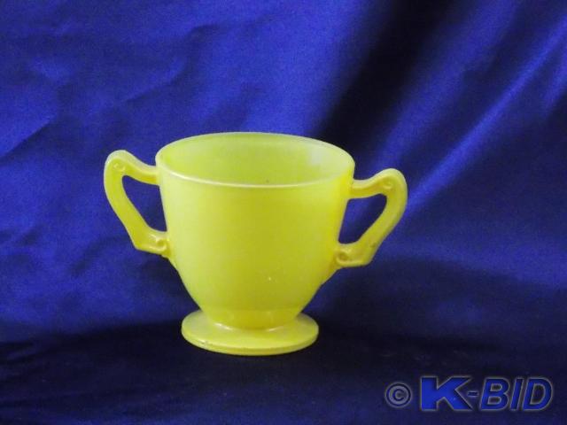 Yellow cup approx 3.25 in dia. by 3...