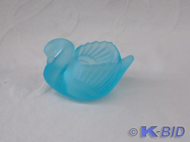 Swan in light blue glass made in ta...