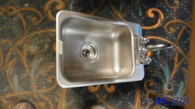 stainless steel sink with faucet.