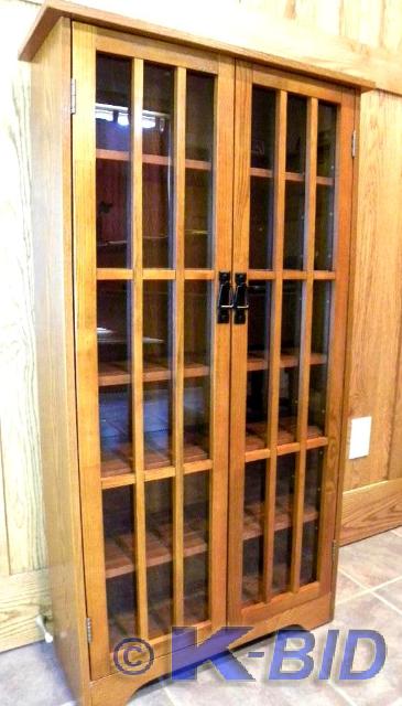 lot 47 image: Mission Media Cabinet, oak wood ven...