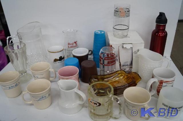 Lot of glasses, coffee cups, and pi...