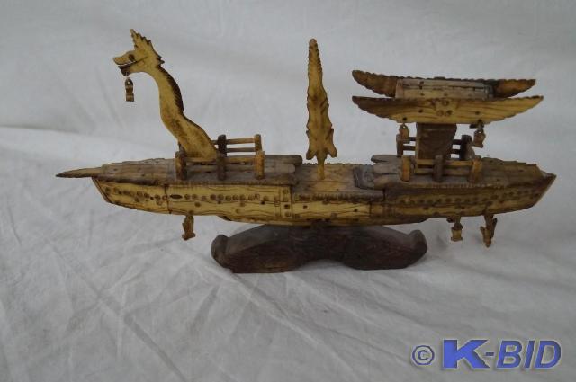 Fish bone boat carving