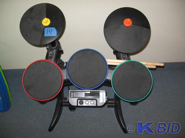 lot 14 image: Guitar Hero Drum Pad set with stick...