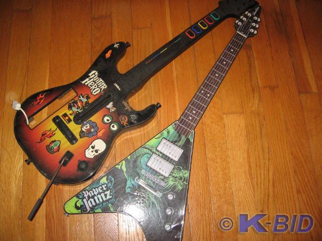 lot 159 image: Game system guitars, no other acces...