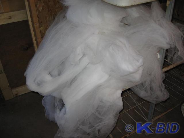 lot 19 image: Large bag full of white mesh