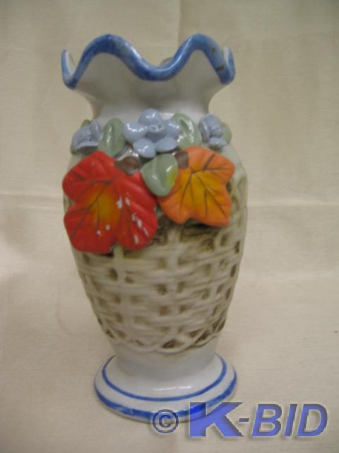 lot 79 image: Porcelain vase with basket weave lo...
