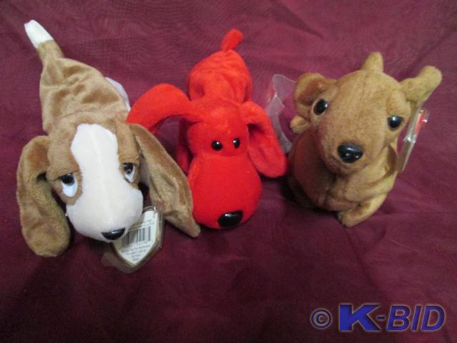 lot 135 image: Ty Beanie Babies. Tracker, Rover, a...