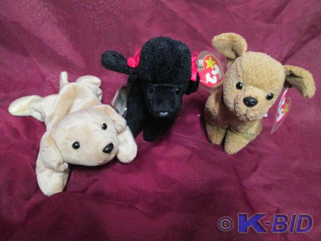 lot 137 image: Ty Beanie Babies. Fetch, GiGi, and ...