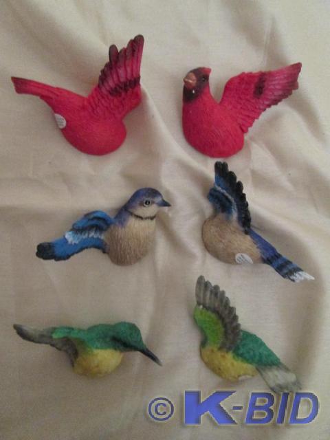 lot 17 image: Set of three magnetic window birds....