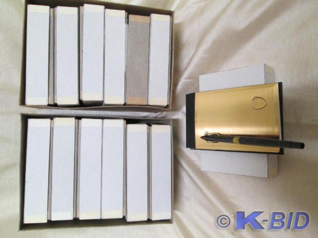 lot 228 image: Lot of 14 gold tone desktop note pa...