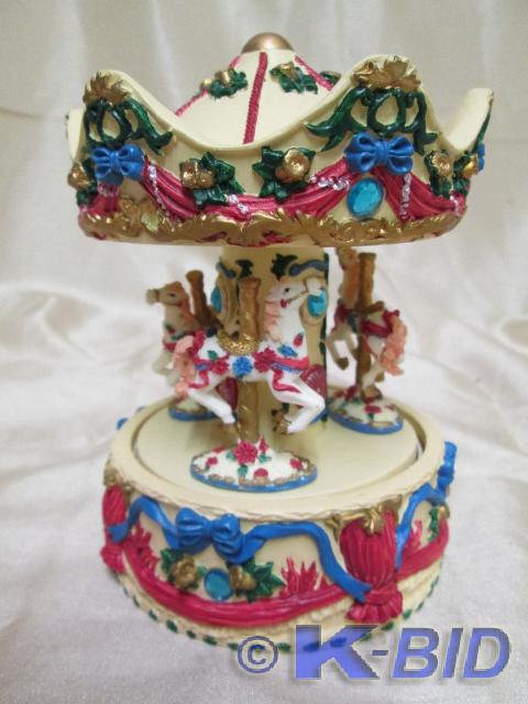 lot 27 image: Revolving musical birthstone carous...