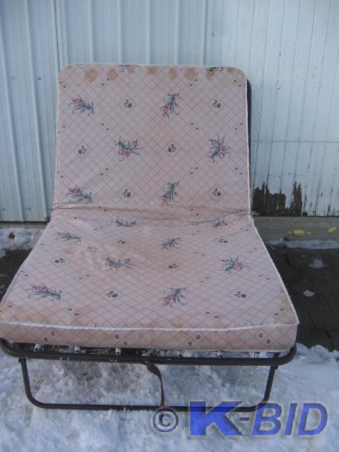 lot 313 image: Folding twin size bed....spring fra...