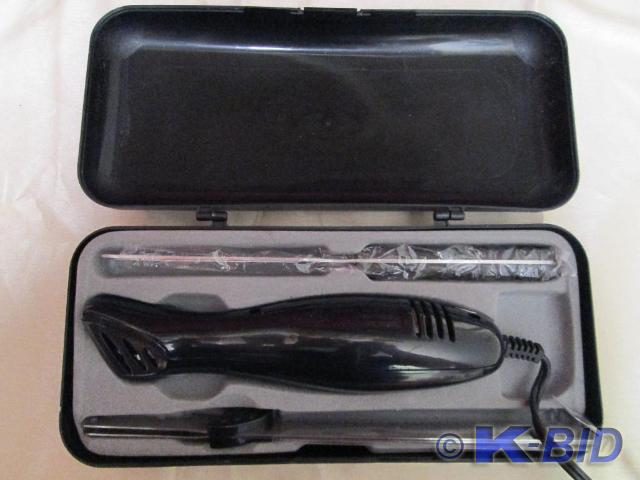 lot 34 image: Very nice electric knife cutting se...