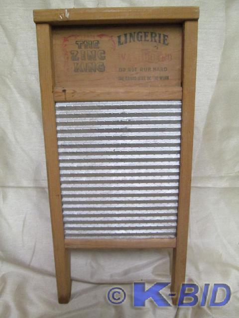 lot 45 image: Miniature Zinc King washboard.