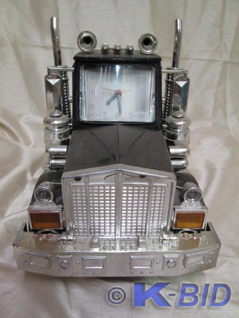 lot 48 image: Semi tractor alarm clock. This cloc...