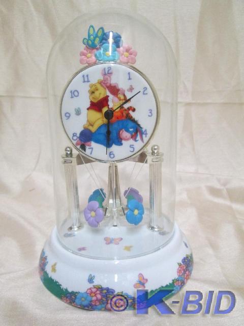 lot 49 image: Winnie the Pooh anniversary clock. ...
