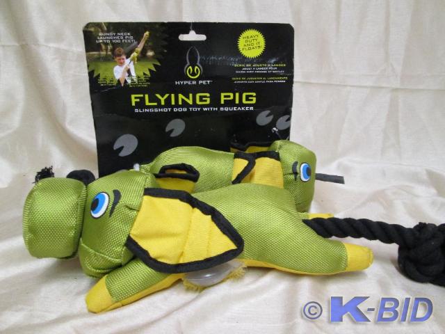 lot 50 image: Flying Pigs. Bungy cord and squeak...